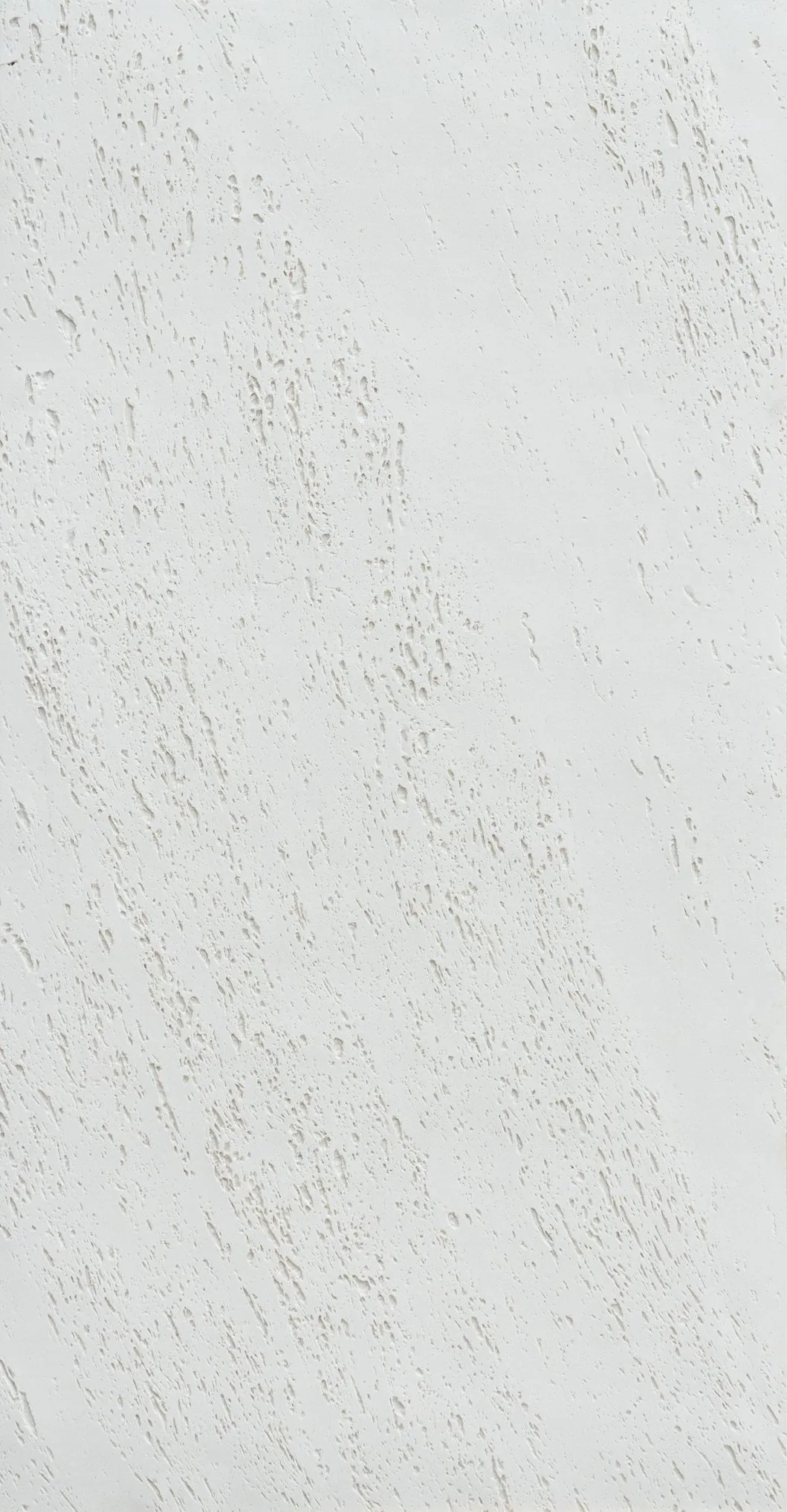 Close up of thin flexible travertine stone sheet surface